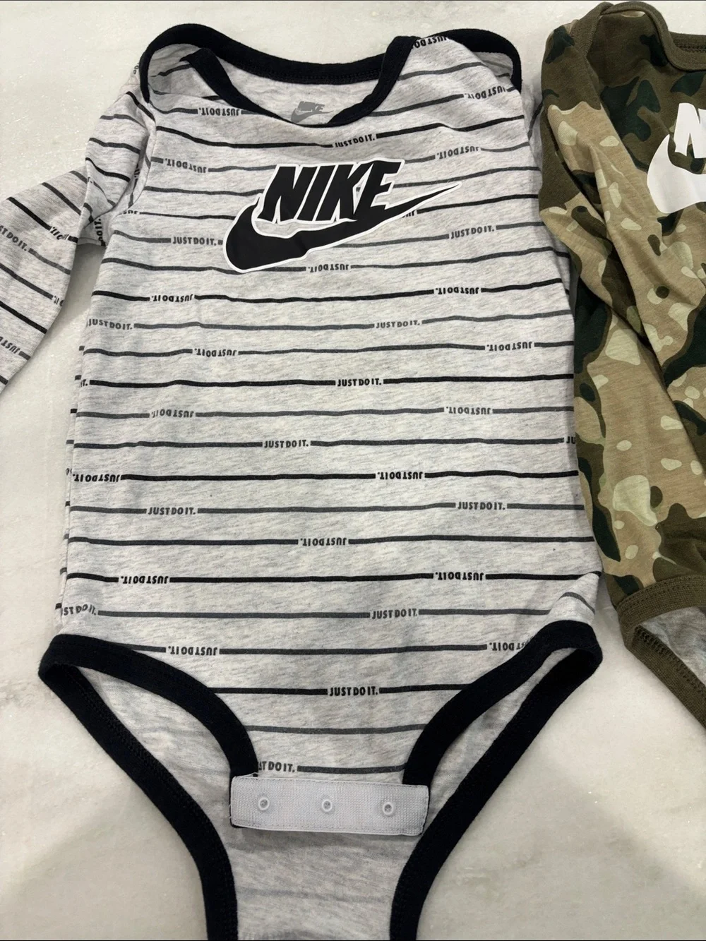 Baby boy Nike bodysuits